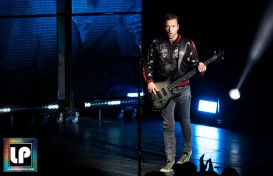 Chris Wolstenholme performs with Muse at Shoreline Amphitheater. Photo by Clay Lancaster.