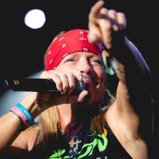Bret Michaels performs with Poison at Oracle Park, San Francisco. Photo by Clay Lancaster
